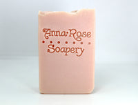 Light pink bar soap on a white background.